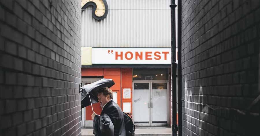 A photo of a sign that says “honest”